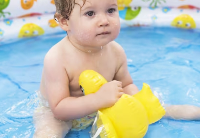 Swimming Diapers Size Everything New Parents Need To Know Before The First Pool Trip